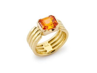 Emerald Cut Orange Sapphire set in 18kt Gold Four Band Ring