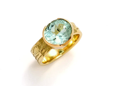 Mint Tourmaline set in 18kt Gold Wave Band