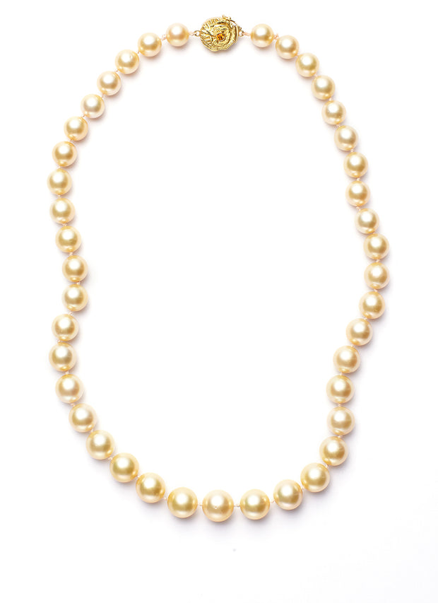 16-inch South Sea Natural Golden Pearls with 18kt Gold and Orange Sapphire Clasp